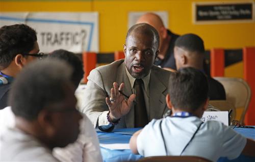 Mentor Rick Fleming speaks to students in Buffalo (Robert Kirkham/Buffalo News)